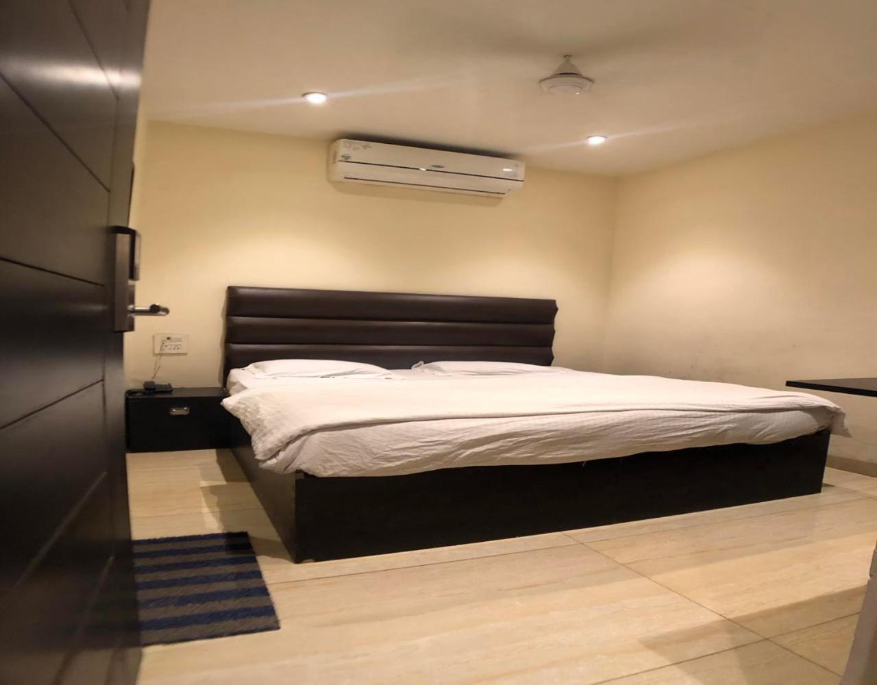 Solitaire Hotel New Delhi Kamer foto